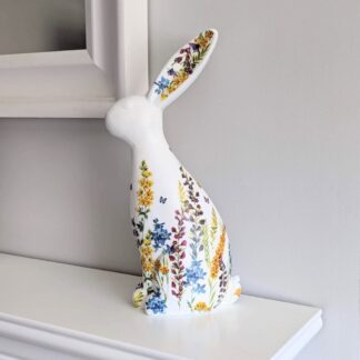 Polyresin hare ornament 30cm painted white and decoupaged with a yellow, purple and blue floral design