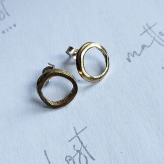 Sterling silver and brass hoop stud earring