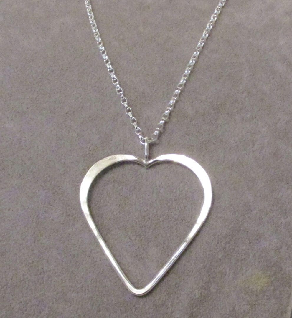 Large silver heart pendant on long silver chain - Image 3