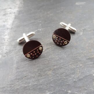 copper cufflinks with dimple texture