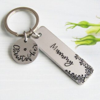 rectangular keyring hand-stamped with Mummy with flower detailing and a personalised name disc with a child's name stamped on it