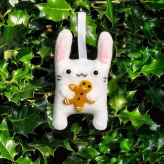 Cute bunny rabbit with gingerbead man Christmas decoration