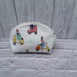 Make up bag, mopeds, sixties them, opens fully
