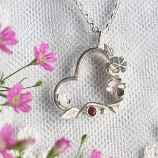 Handmade Recycled Silver 'Flowers in my heart' pendant