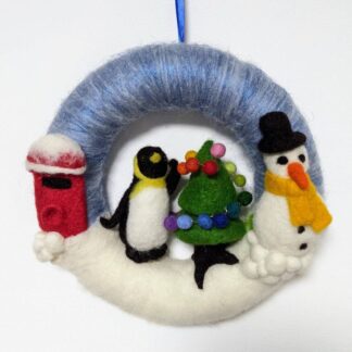 Cute penguin - themed Christmas wreath with snowman, tree and postbox. Needle felted, handmade and unique festive cheer for your interior door.