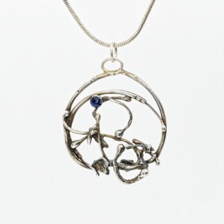 Abstract Floral circle pendant