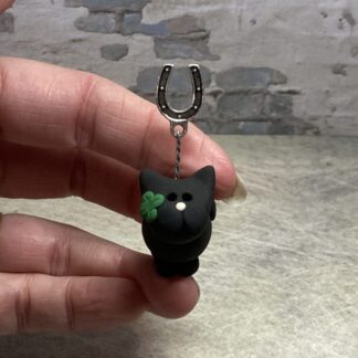 miniature clay cat figure