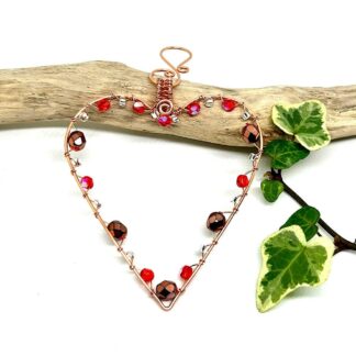Orange heart decoration in copper