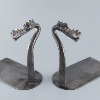 Hand Forged Bookends. A pair of dragon bookends forged by a blacksmith