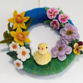 colourful easter wreath with chicks and flowers