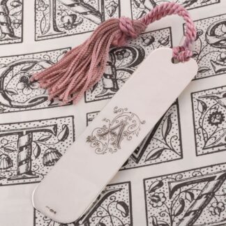 handcrafted sterling silver bookmark with deeply engraved initial
