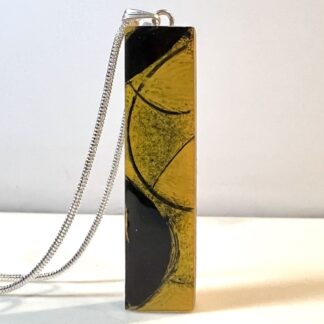 retro style black and yellow pendant