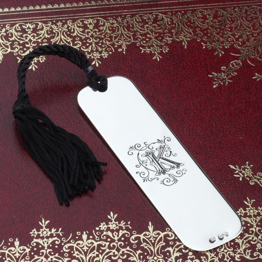 engraved ornate initial on silver bookmark