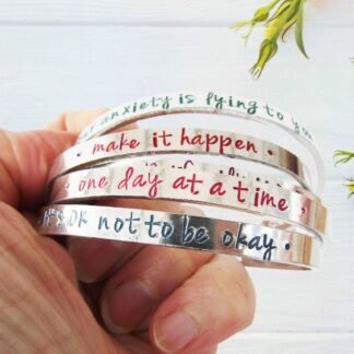 6mm aluminium cuff hand-stamped with a motivational quote in a choice of colours
