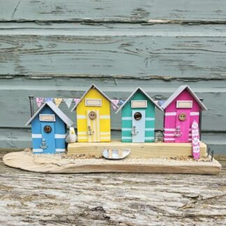 Colourful Wooden Beach Hut Scene in Teal, Yellow, Hot Green and Hot Pink with Seagull, Surfboard and Mussel Shell Boat