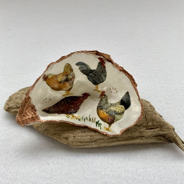 A handcrafted Decoupaged Oyster Shell