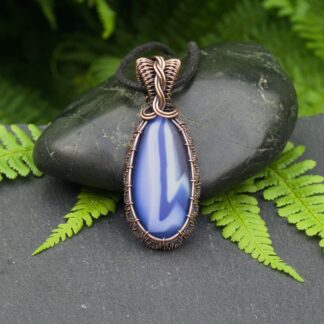 Copper wire wrapped blue fused glass pendant by Oruki Design