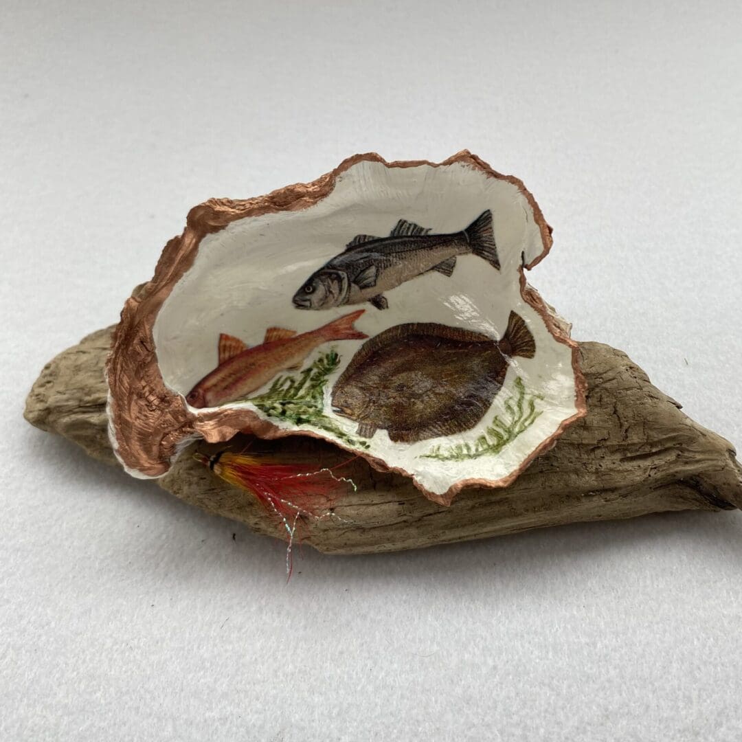 A handcrafted Decoupaged Oyster Shell
