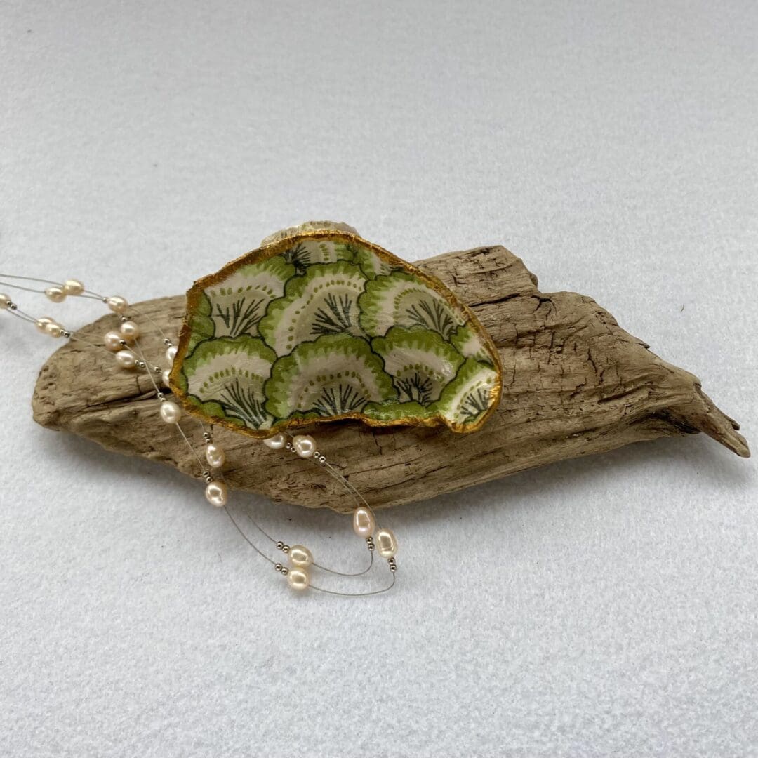 A handcrafted Decoupaged Oyster Shell