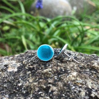 Large round silver studs with turquoise blue enamel