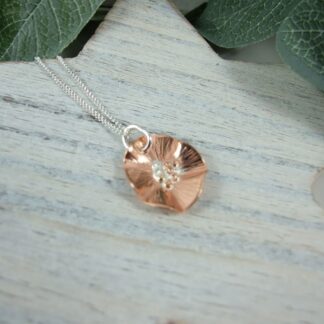 copper and silver poppy necklace