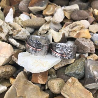 Textured silver and copper wrap rings