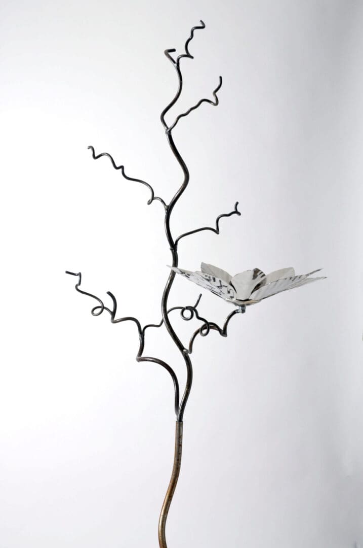 Robust and beautifully designed artistic bird feeding table with a stainless steel flower feeder. The depth of the feeder allows for a dish to be placed into the flower as a bird bath which can be removed for easy cleaning to prevent disease.