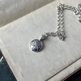 Daisy Wheel or Hexafoil pendant