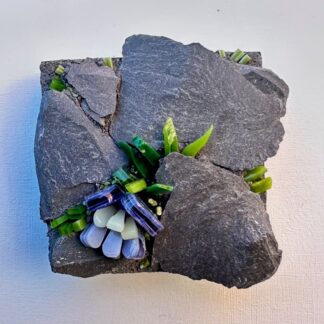 Miniature slate mosaic rockery,purple flowers