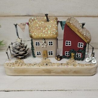 Winter Cottage Scene with Christmas Tree