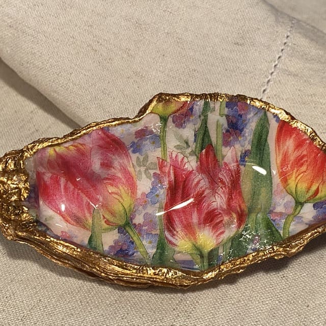 A handmade decoupaged oyster featuring fabulous parrot tulips