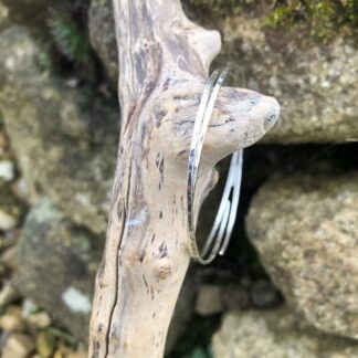 Hammered sterling silver hoop earrings in 5cm diameter