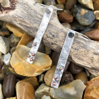 Long, narrow, textured silver and copper drop earrings