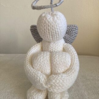 A-Knitted-Sitting-Angel-With-Wings-And-A-Halo
