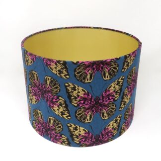 Butterfly drum lampshade in teal, purple, and gold