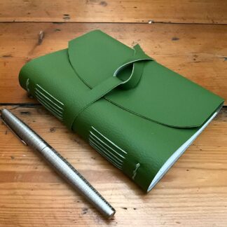 Apple Green Faux Leather Wrap Journal filled with plain paper