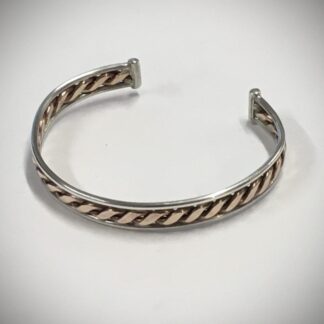 Bronze twist bangle edged with silver