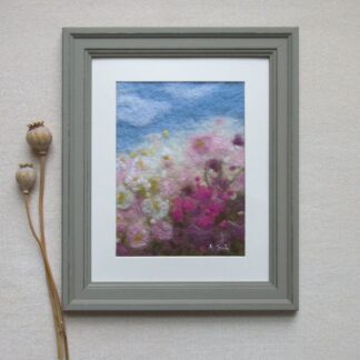 Abstract pink and white flowers with green foliage against a blue sky with white clouds.