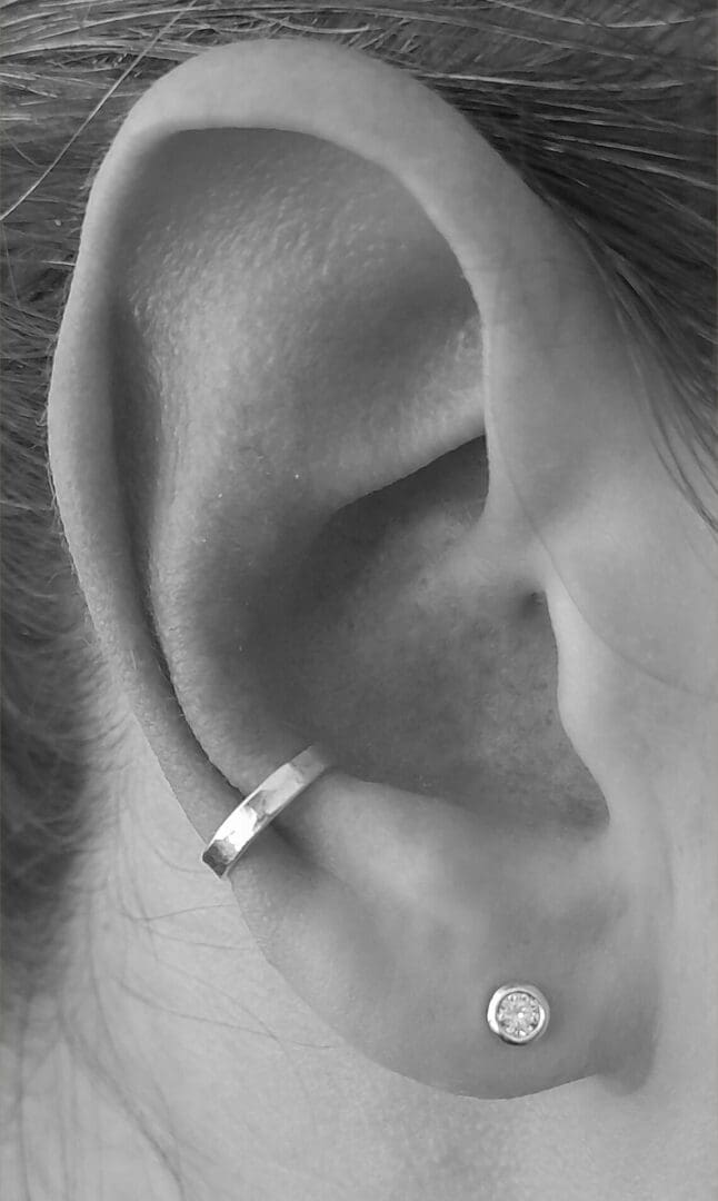 hammered sterling silver ear cuff on ear