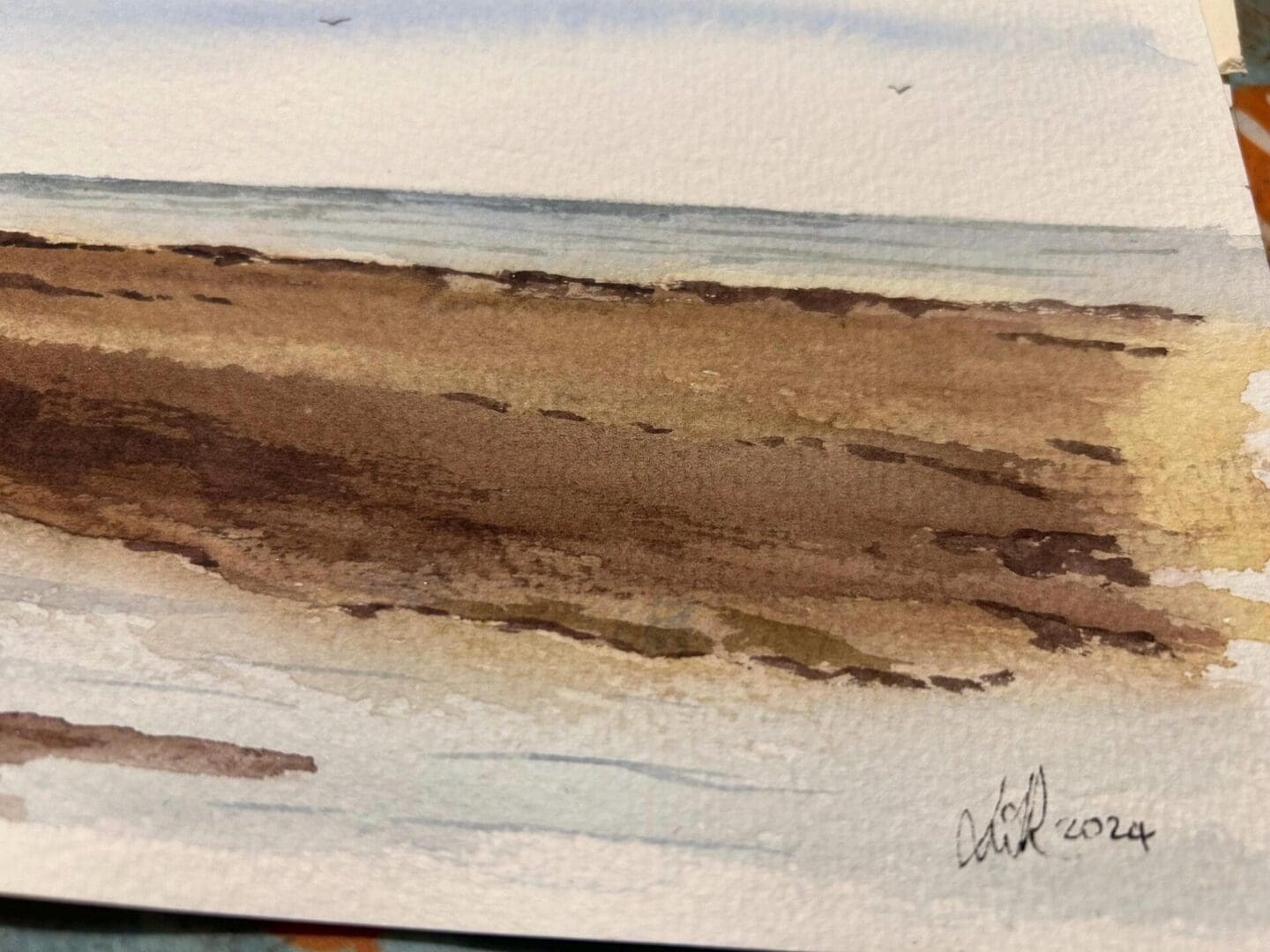 close up of artist's signature for a watercolour painting of St Michaels Mount, near Penzance, Cornwall