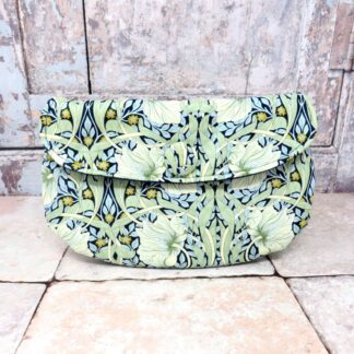 A cotton lawn makeup pouch in navy and green.