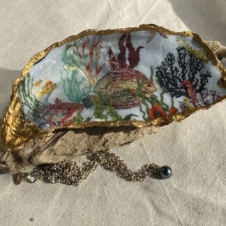 A handcrafted Decoupaged Oyster Shell
