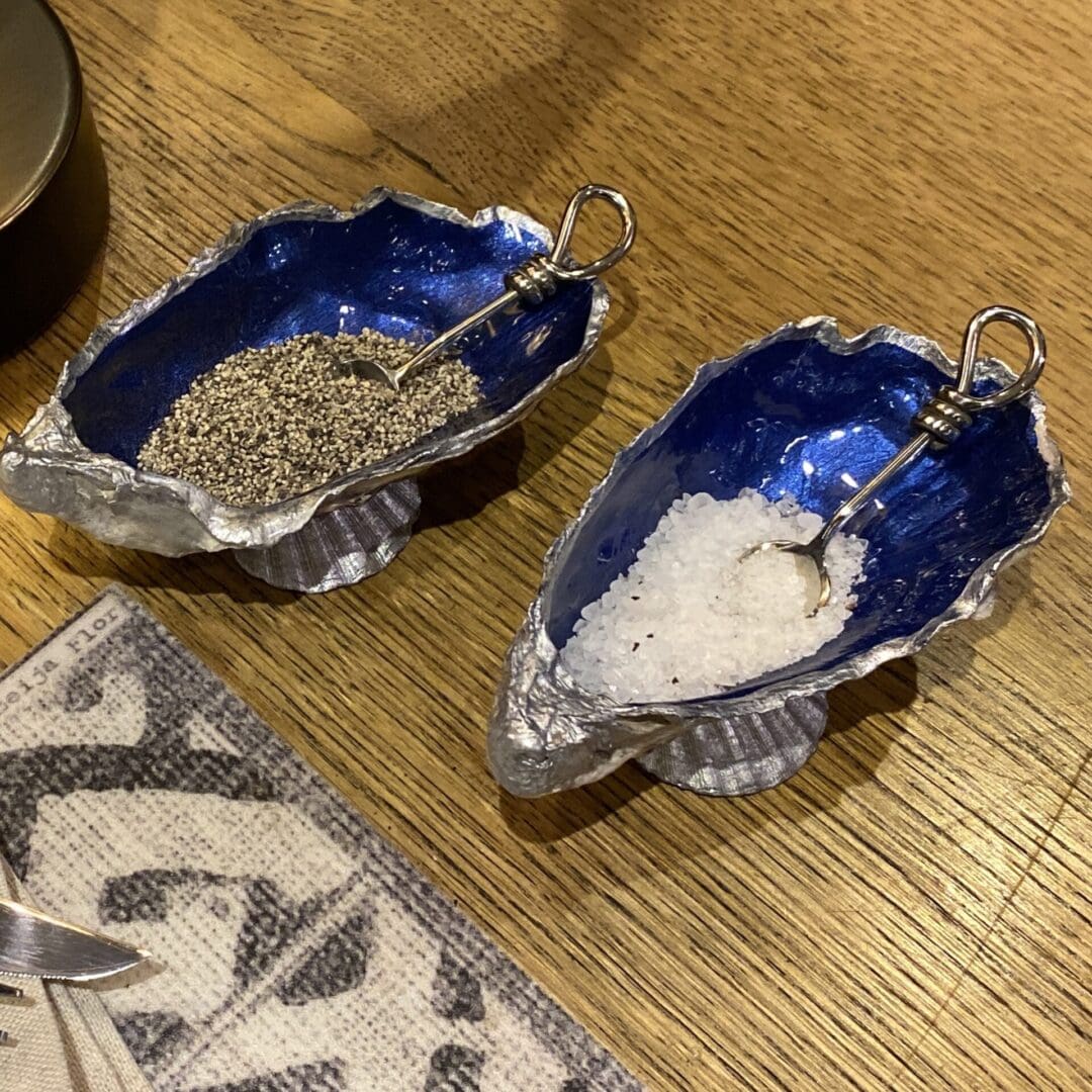 Salt and Pepper shells with spoons