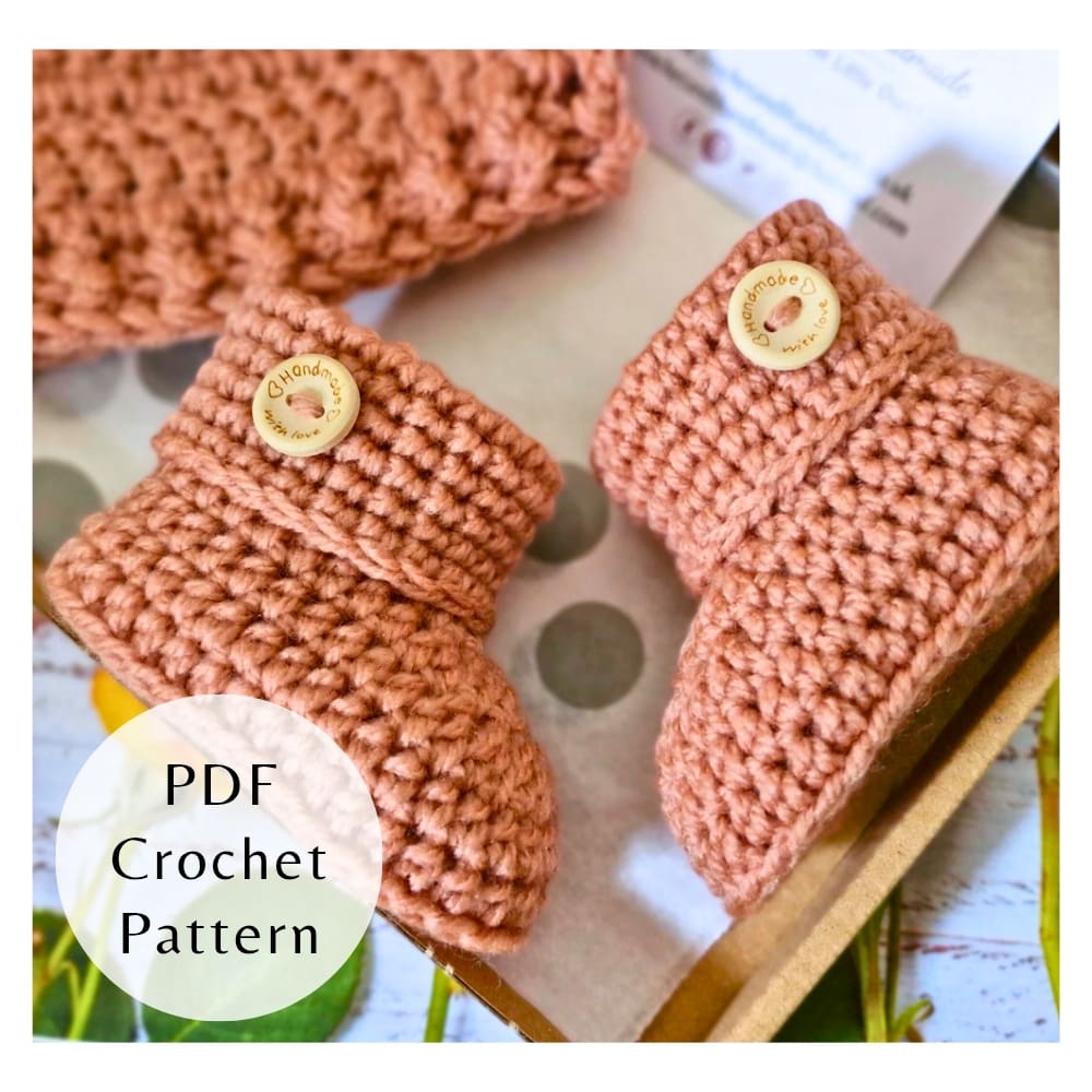 A digital PDF crochet pattern for baby button booties displayed in Milky Tea with wooden buttons.