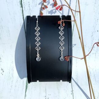 Elegant long silver earrings with faceted quartz