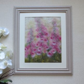 Three abstract foxgloves in faded shades of pink, cream and white with green foliage at the base.