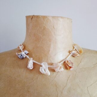 Natural seashell necklace on crochet chain