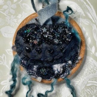 Black felt Pumpkin on a 3" embroidery hoop