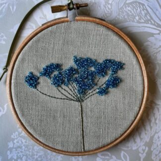 Blue beaded Cow parsley on a 4" embroidery hoop.