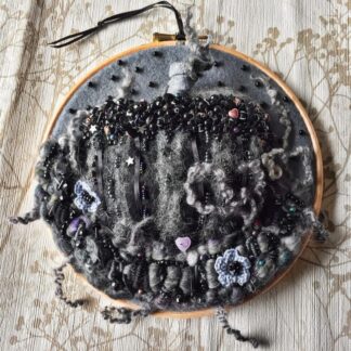 Black felt Pumpkin on a 7" embroidery hoop
